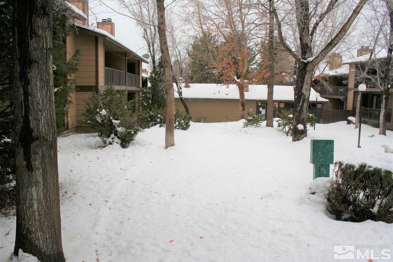 2989 Tierra Verde East Reno, NV 89512 - Photo 18 of 18 a view of a yard covered in snow