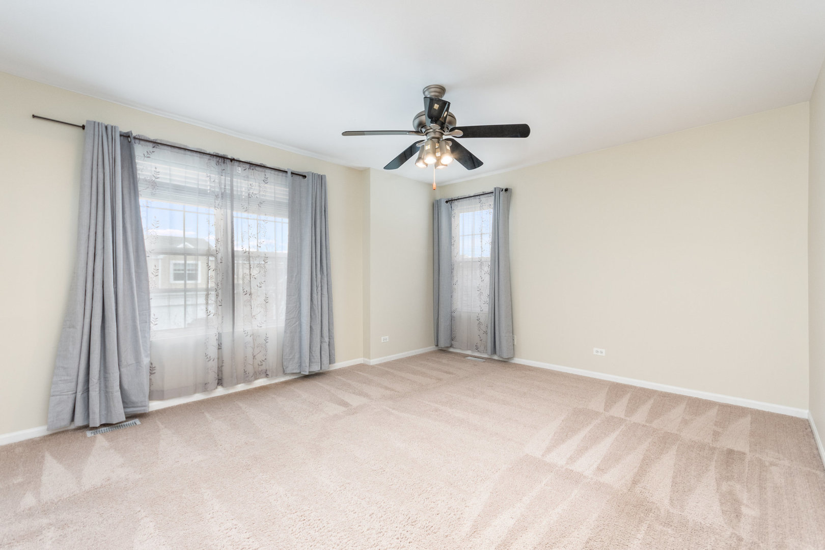 608 Springbrook Trail North Oswego, IL 60543 - Photo 13 of 24 a view of empty room with windows