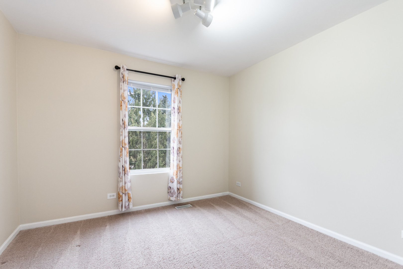 608 Springbrook Trail North Oswego, IL 60543 - Photo 16 of 24 an empty room with a window