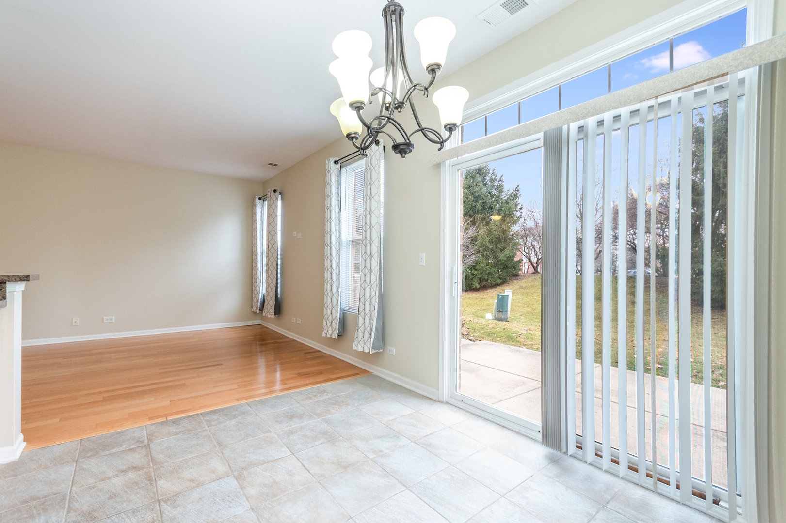 608 Springbrook Trail North Oswego, IL 60543 - Photo 7 of 24 a view of a chandelier in a room with a chandelier