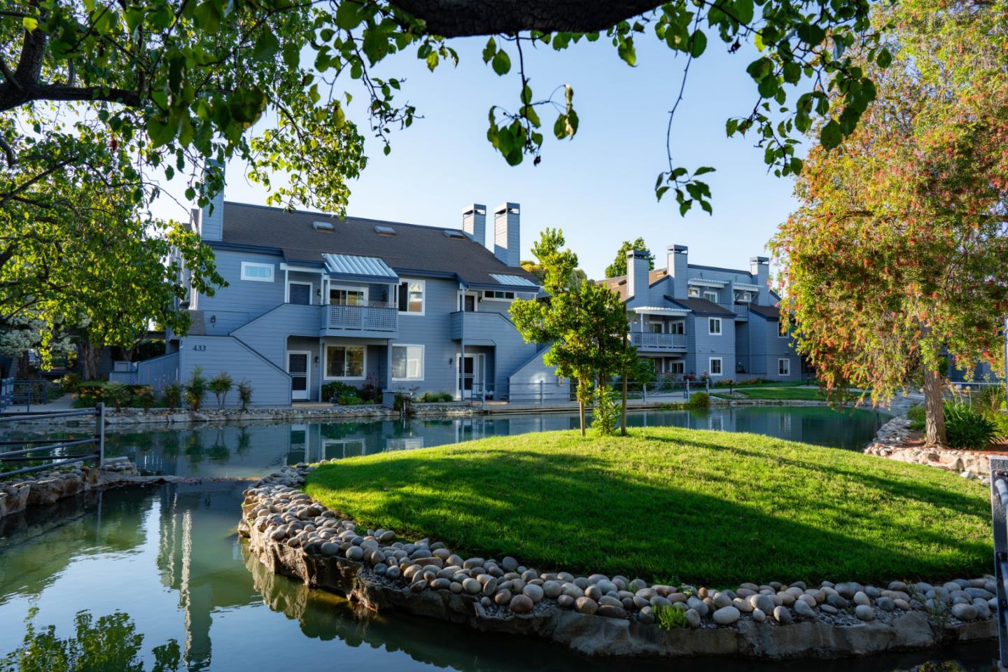 413 Cork Harbour Circle, Unit E Redwood City, CA 94065 - Photo 19 of 23 a house with garden in front of it