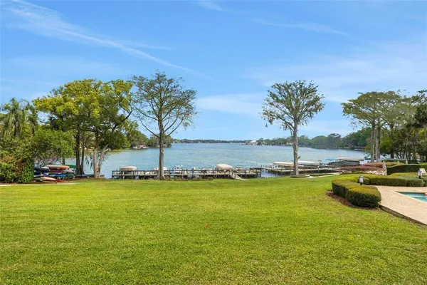 a view of a swimming pool and lounge chair