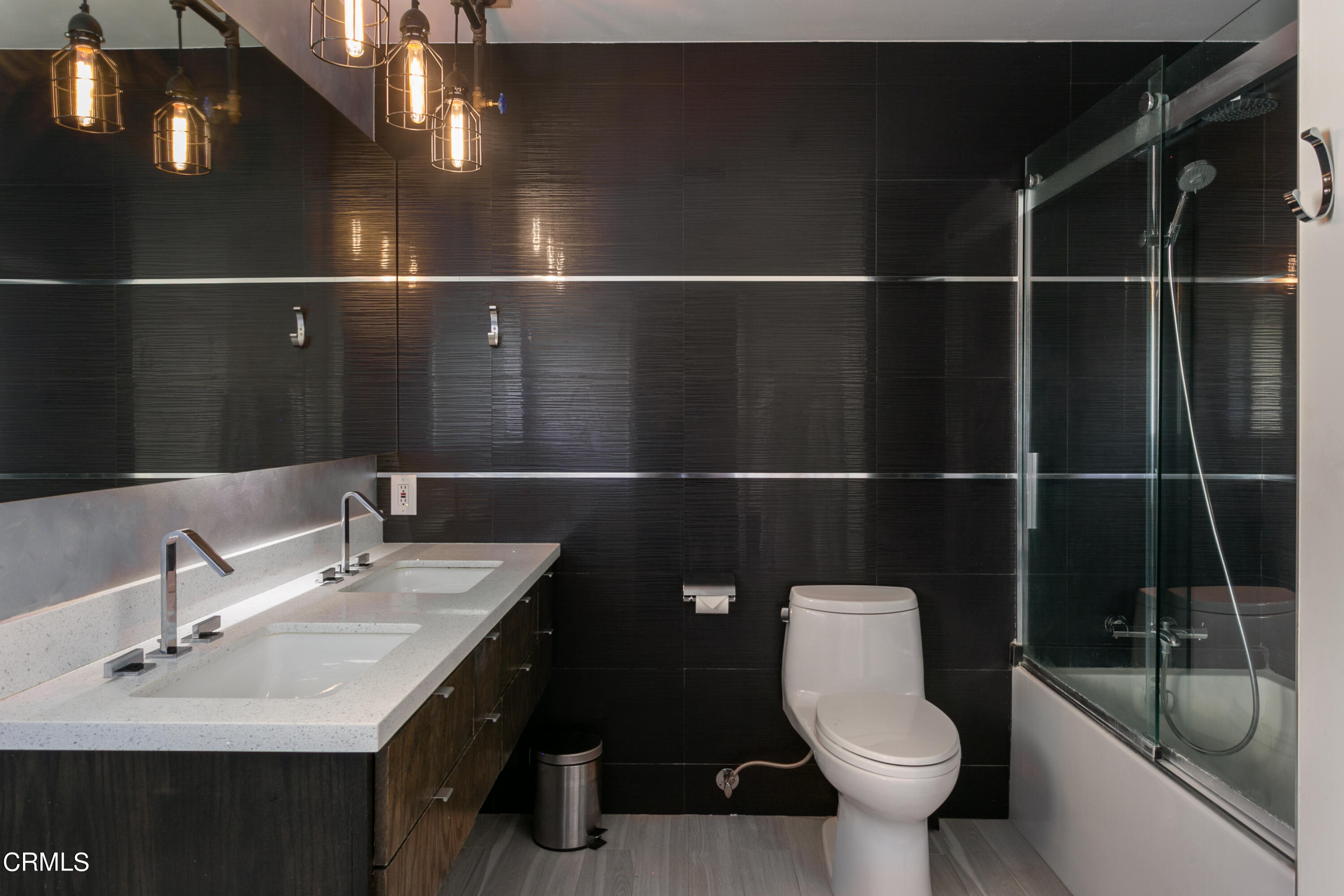 1050 Seco Street, Unit 210 Pasadena, CA 91103 - Photo 9 of 14 a bathroom with a sink a toilet and a mirror