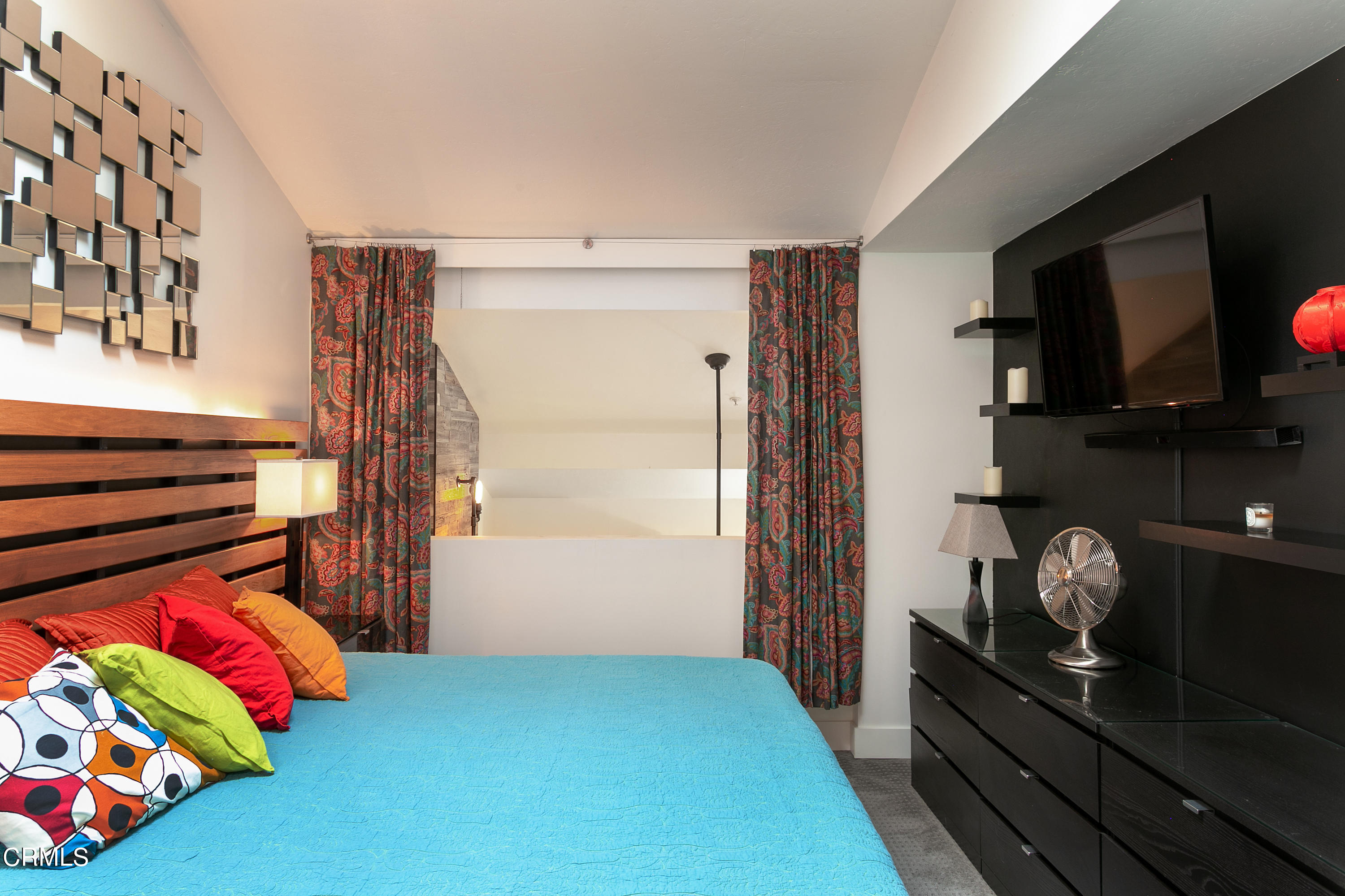 1050 Seco Street, Unit 210 Pasadena, CA 91103 - Photo 10 of 14 a bedroom with a bed and flat screen tv