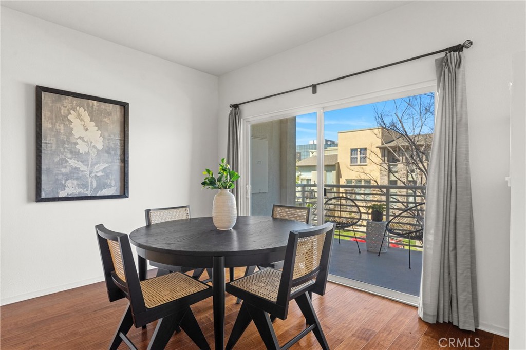 5540 Strand, Unit 201 Hawthorne, CA 90250 - Photo 11 of 31 a view of a dining room with furniture window and wooden floor