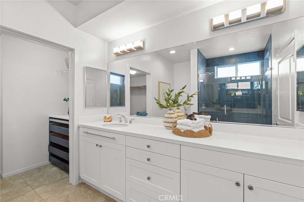 5540 Strand, Unit 201 Hawthorne, CA 90250 - Photo 16 of 31 a bathroom with a sink and mirror