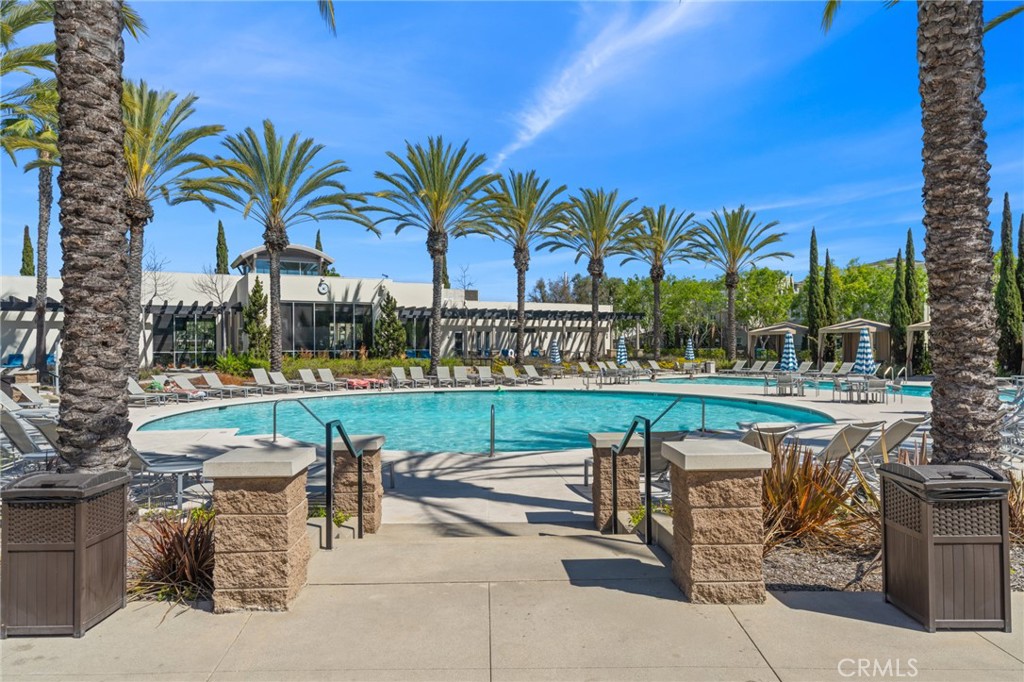 5540 Strand, Unit 201 Hawthorne, CA 90250 - Photo 23 of 31 a view of swimming pool with outdoor seating and green space