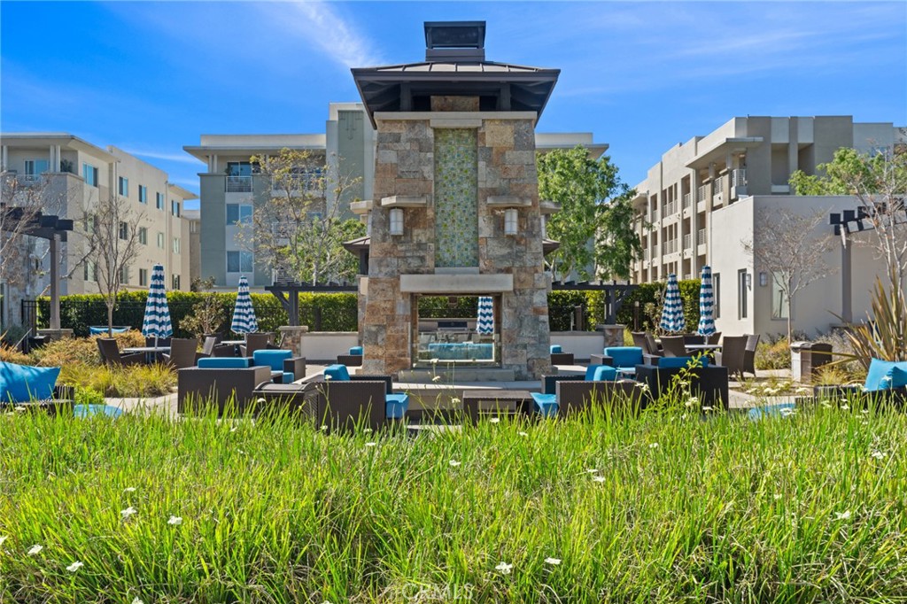 5540 Strand, Unit 201 Hawthorne, CA 90250 - Photo 25 of 31 a view of a house with a chairs in a patio