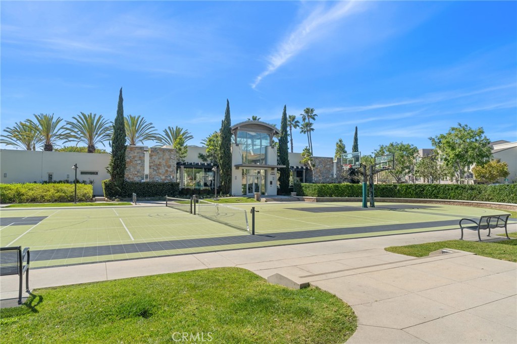 5540 Strand, Unit 201 Hawthorne, CA 90250 - Photo 27 of 31 a view of a swimming pool with a yard and palm trees