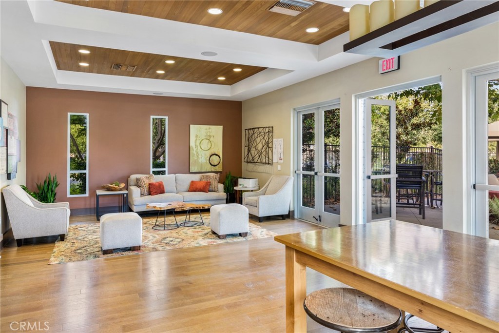 5540 Strand, Unit 201 Hawthorne, CA 90250 - Photo 29 of 31 a living room with furniture and a large window