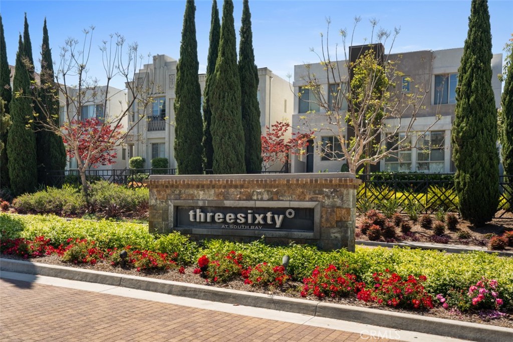 5540 Strand, Unit 201 Hawthorne, CA 90250 - Photo 31 of 31 a sign on the side of a building