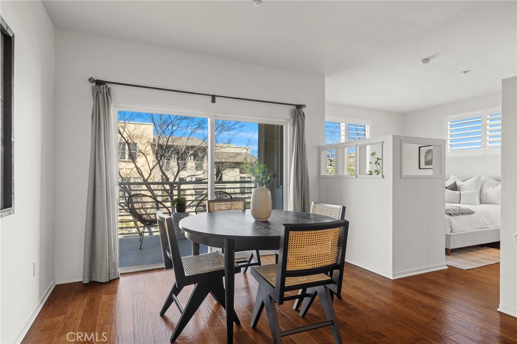5540 Strand, Unit 201 Hawthorne, CA 90250 - Photo 10 of 31 a view of a dining room with furniture window and wooden floor