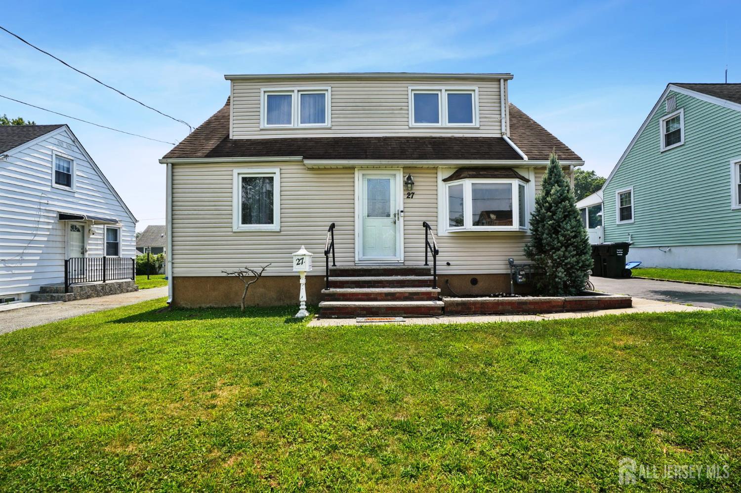 27 George Street Avenel, NJ 07001 - Photo 1 of 29 a view of a yard in front of a house