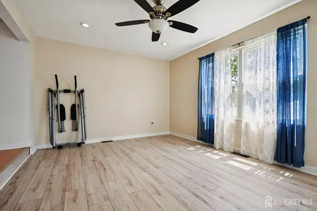 a view of entryway with wooden floor