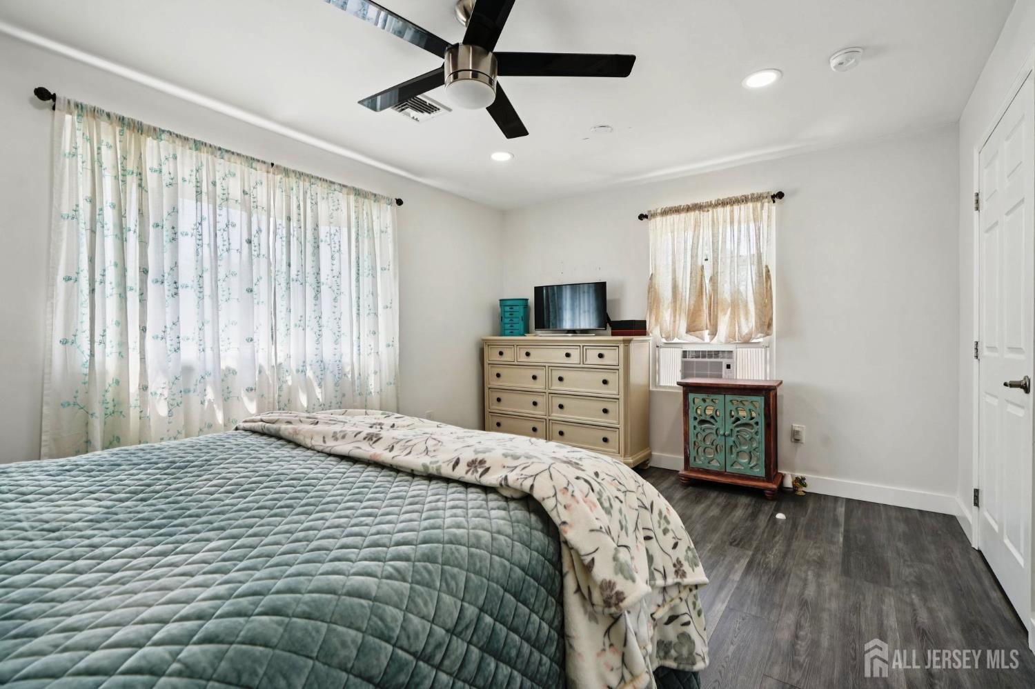 27 George Street Avenel, NJ 07001 - Photo 21 of 29 a bedroom with a bed and a window