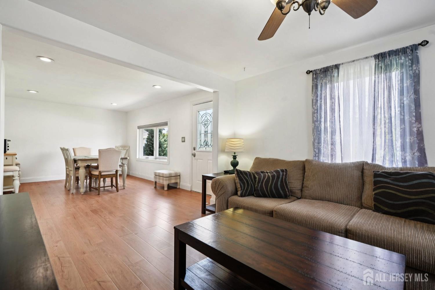 27 George Street Avenel, NJ 07001 - Photo 5 of 29 a living room with furniture and a couch