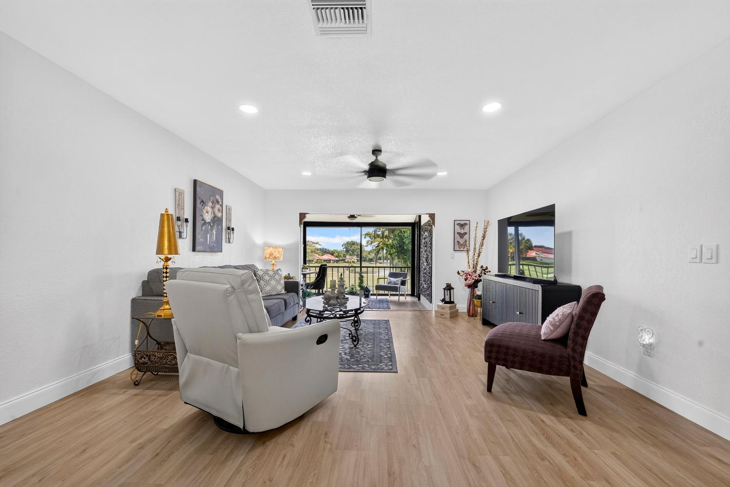 8425 Casa Del Lago, Unit H Boca Raton, FL 33433 - Photo 14 of 42 015-001-Living Room-1500x1000