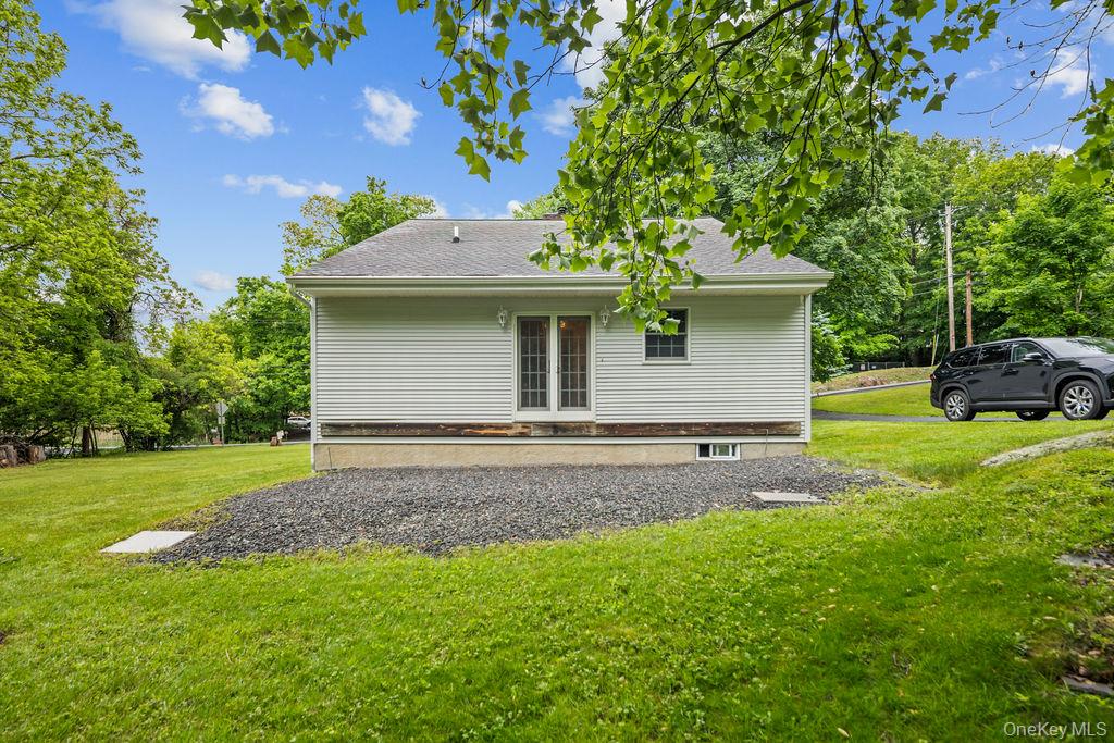 289 Seven Springs Mountain Road Monroe, NY 10950 - Photo 23 of 25 a view of a backyard with a garden