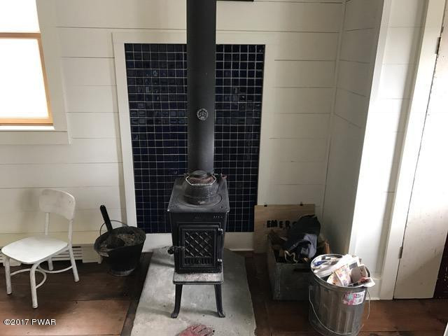 70 Moody Road Pleasant Mount, PA 18453 - Photo 57 of 67 kitchen woodstove