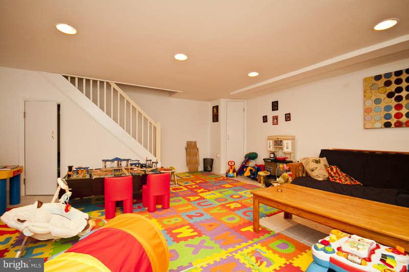 416 Hopkins Road Baltimore, MD 21212 - Photo 12 of 30 a living room with furniture and a floor to ceiling window