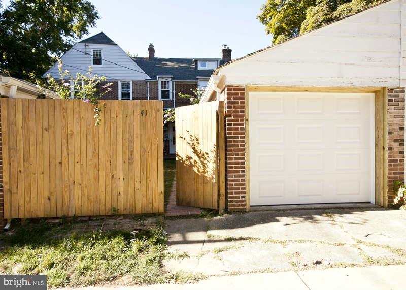 416 Hopkins Road Baltimore, MD 21212 - Photo 28 of 30 a front view of a house with a yard