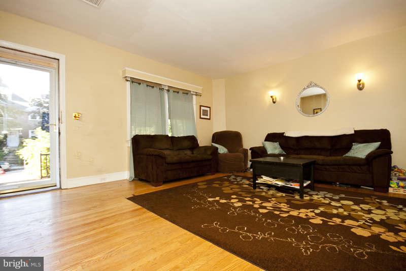 416 Hopkins Road Baltimore, MD 21212 - Photo 5 of 30 a living room with furniture and a wooden floor