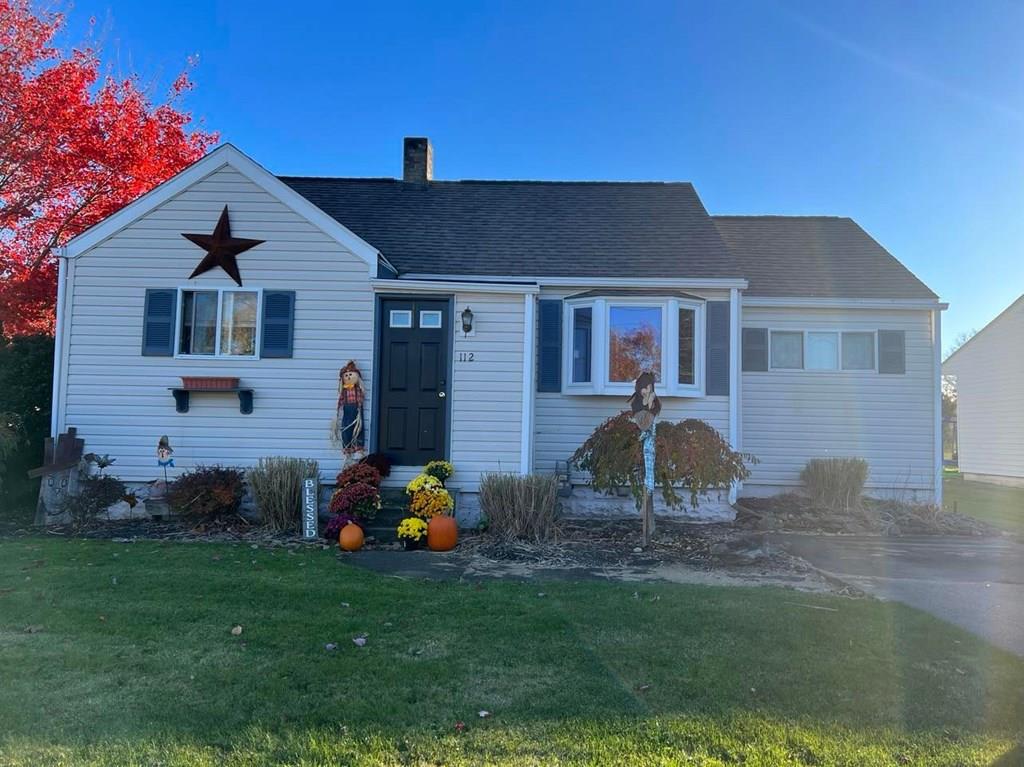 112 Baker Street Rimersburg, PA 16248 - Photo 1 of 23 a front view of a house with garden