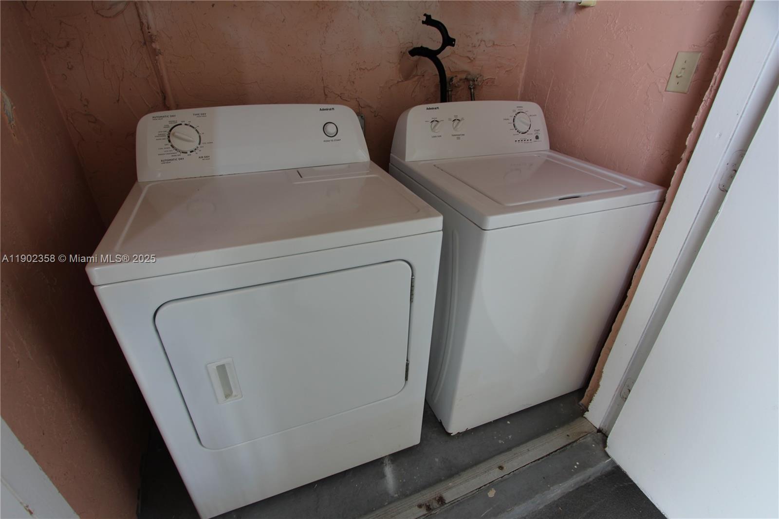 8540 Southwest 212th Street, Unit 203 Cutler Bay, FL 33189 - Photo 11 of 29 a utility room with dryer and washer