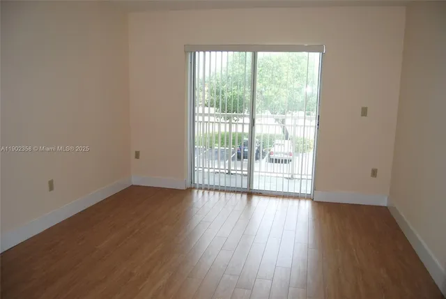 a view of a room with an empty walk in closet