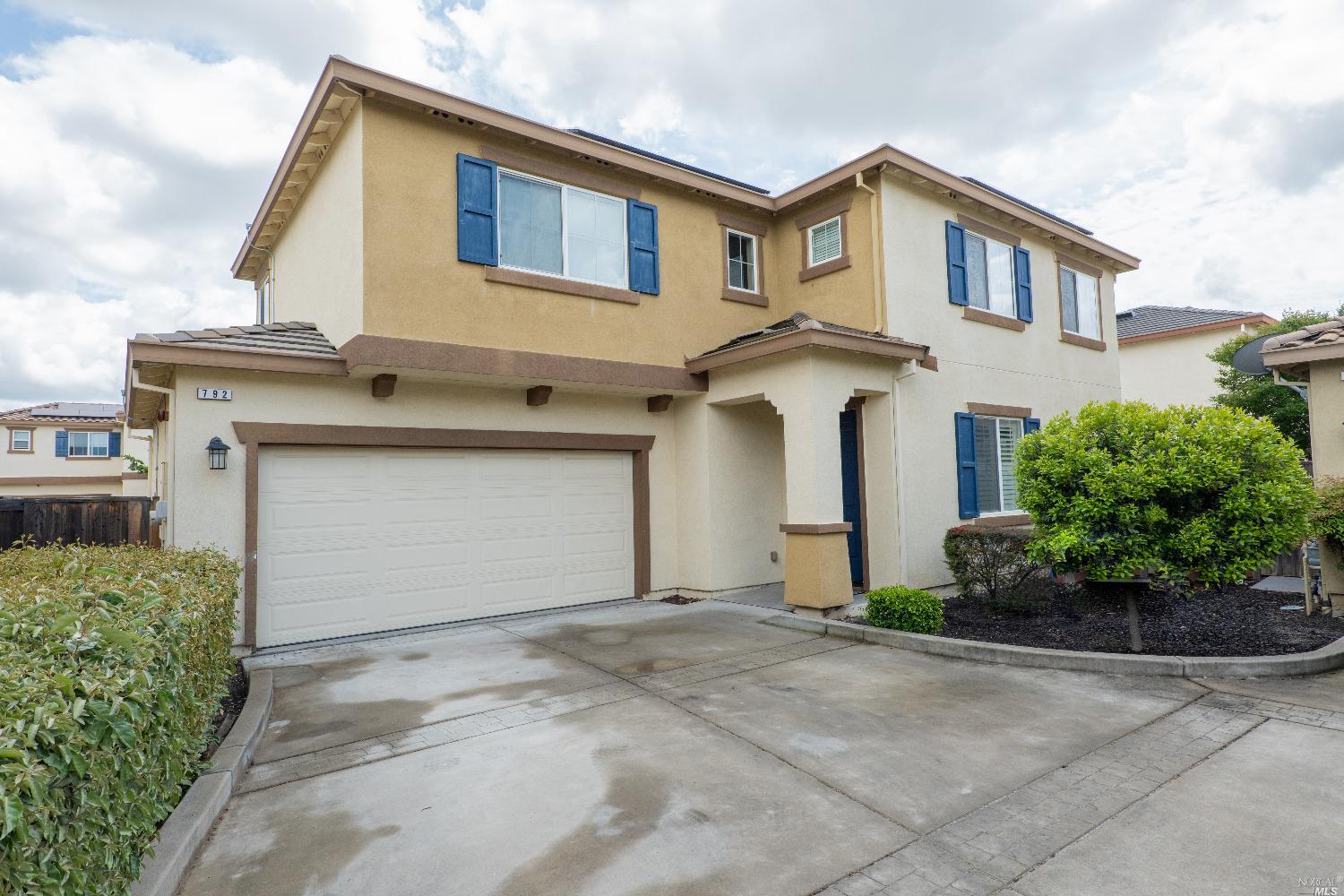 792 Embassy Circle Vacaville, CA 95688 - Photo 1 of 1 a front view of a house with garden