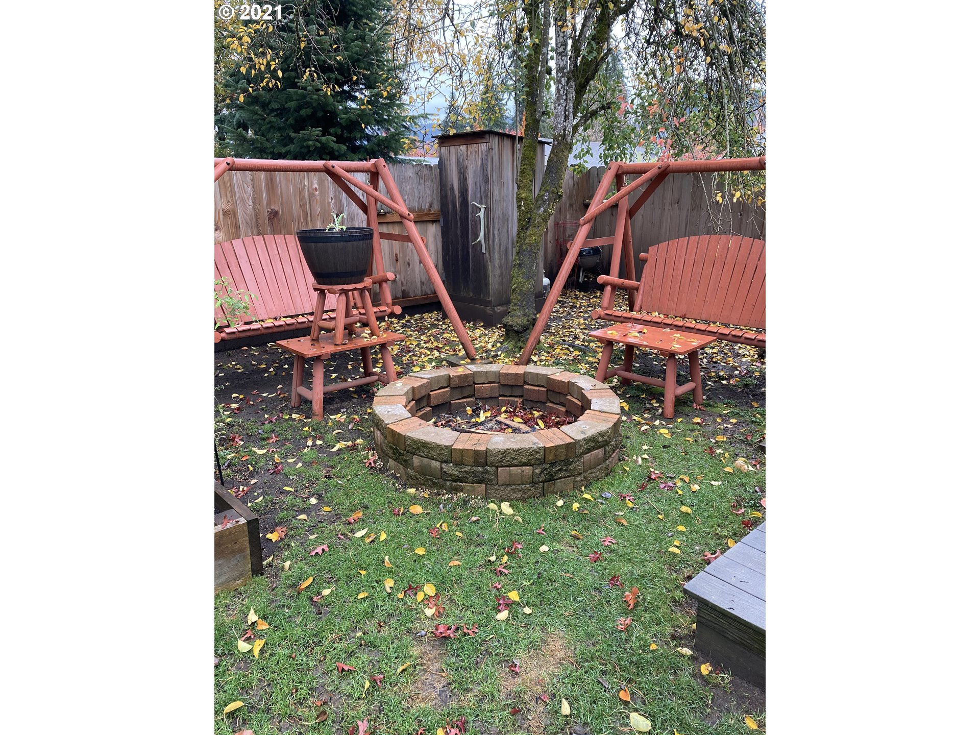 5871 Thurston Road Springfield, OR 97478 - Photo 22 of 28 a view of a backyard with sitting area and furniture