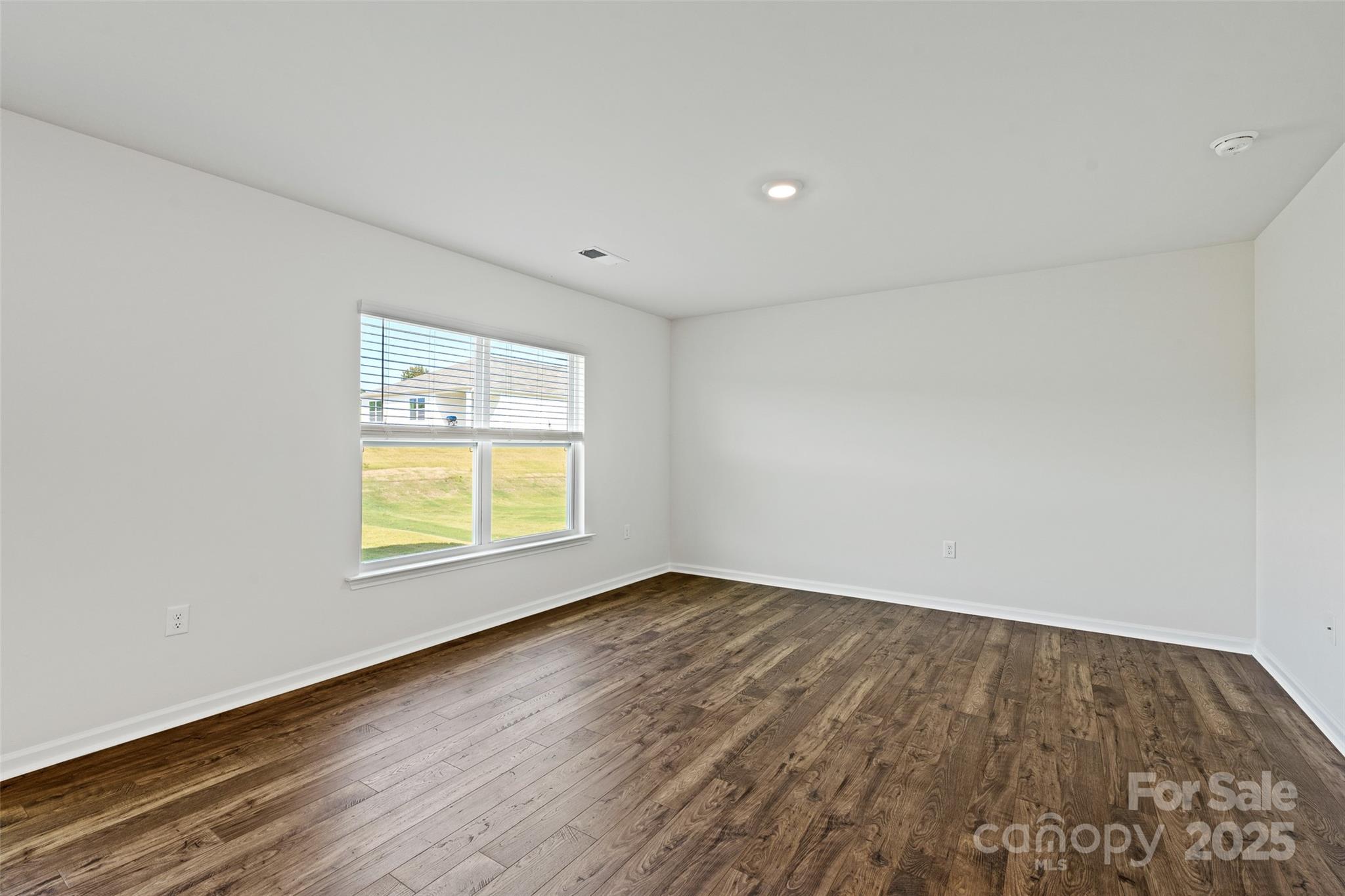 135 Callie River Clyde, NC 28721 - Photo 12 of 18 an empty room with a window