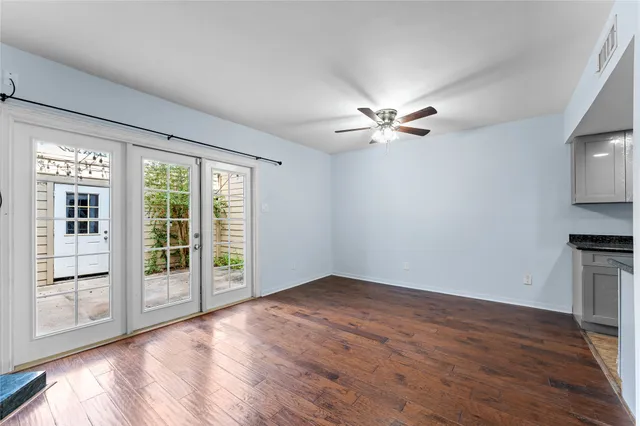 a view of kitchen with sink microwave and stove