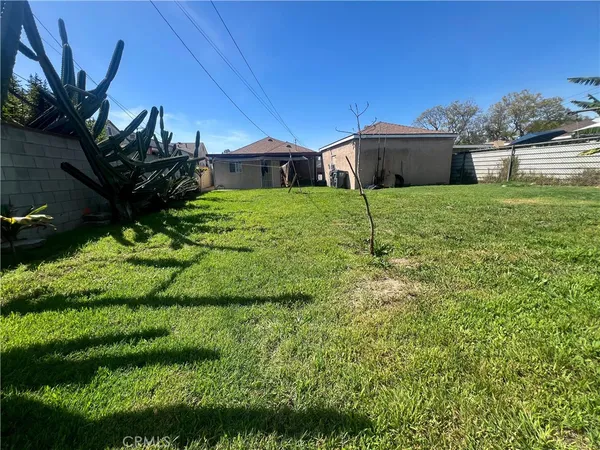 a house view with a garden space