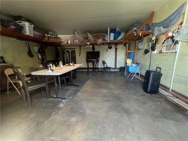 a view of a chairs and tables in patio