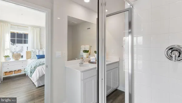 a bathroom with a sink toilet and vanity