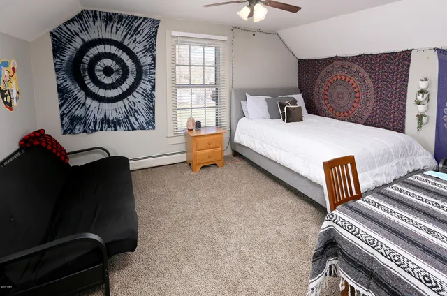 a view of houses with truck parked