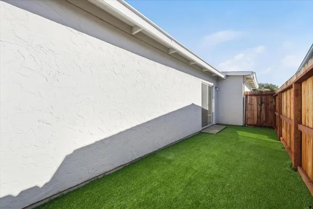 a view of a backyard with stairs