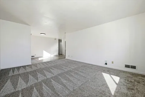 a view of a room with an empty space