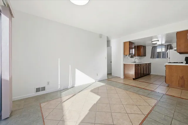 a view of a kitchen with a sink