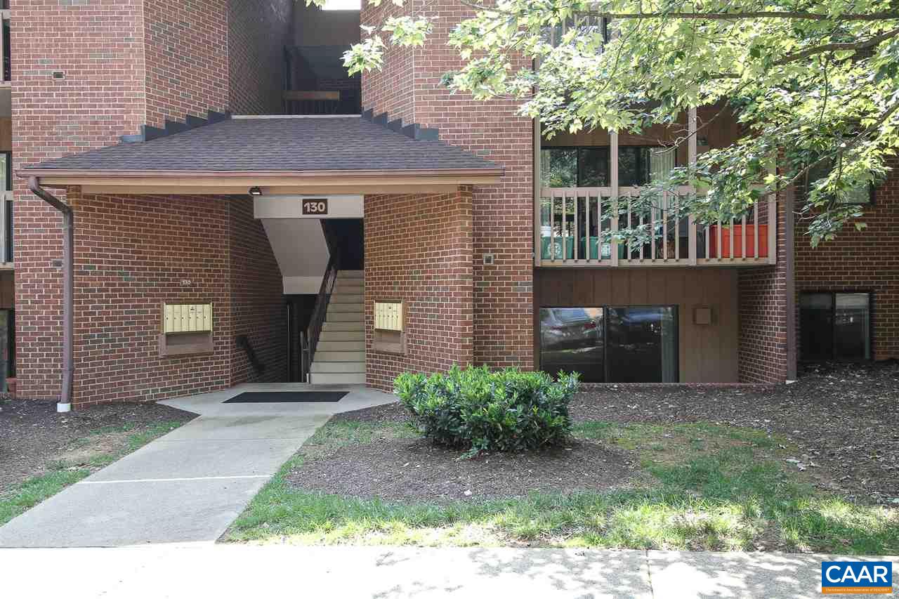130 Turtle Creek Road, Unit 4 Charlottesville, VA 22901 - Photo 1 of 13 a front view of a house with a yard and a garage