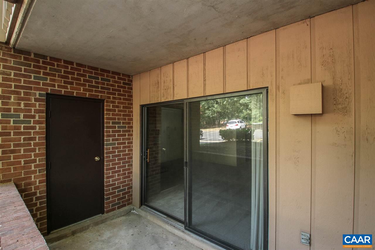 130 Turtle Creek Road, Unit 4 Charlottesville, VA 22901 - Photo 12 of 13 a bathroom with a glass door shower