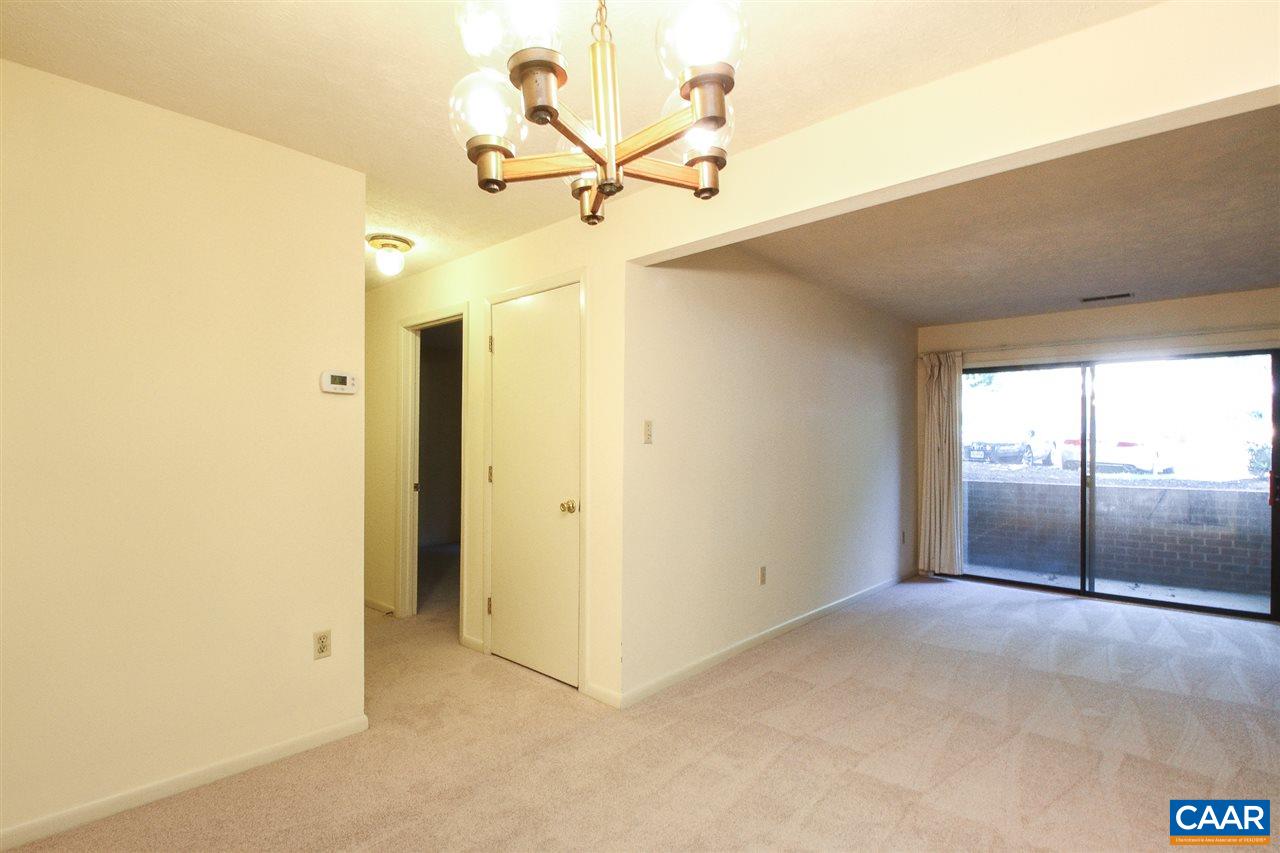 130 Turtle Creek Road, Unit 4 Charlottesville, VA 22901 - Photo 5 of 13 a view of a room with a ceiling fan