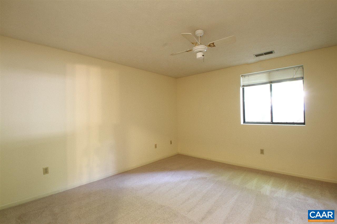 130 Turtle Creek Road, Unit 4 Charlottesville, VA 22901 - Photo 9 of 13 an empty room with a window