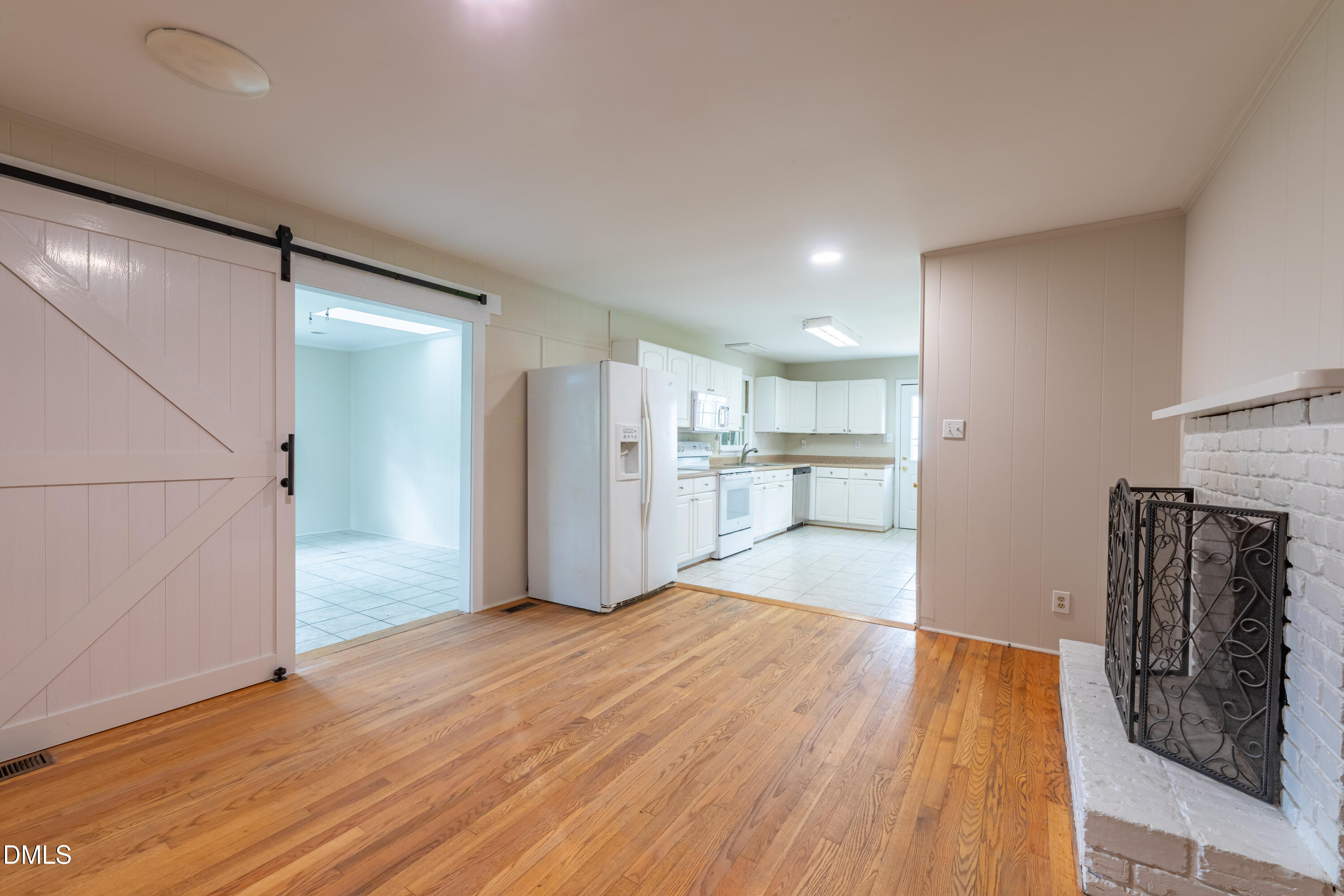 408 Ortega Road Raleigh, NC 27609 - Photo 9 of 25 a view of kitchen with wooden floor