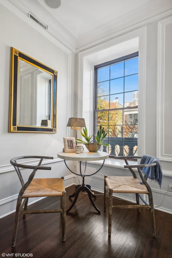 443 West Aldine Avenue, Unit 3 Chicago, IL 60657 - Photo 6 of 19 a living room with furniture a table and a large window