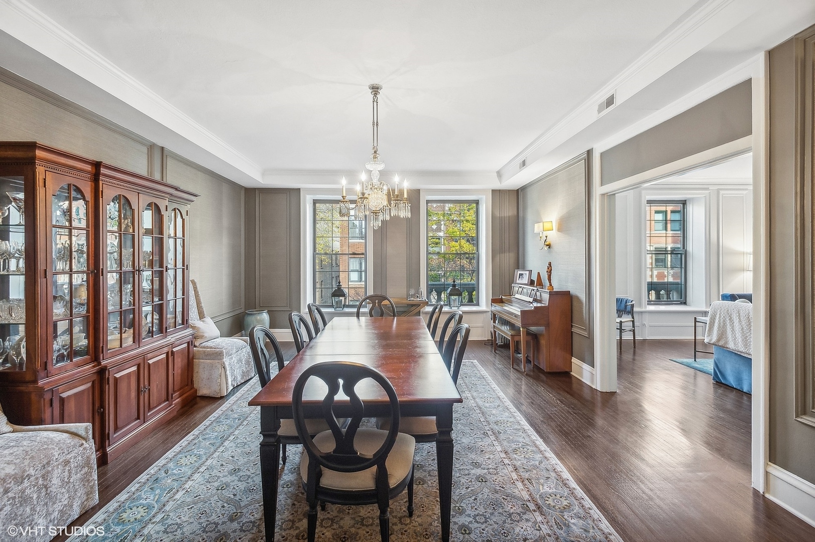 443 West Aldine Avenue, Unit 3 Chicago, IL 60657 - Photo 8 of 19 a view of a dining room with furniture window and wooden floor