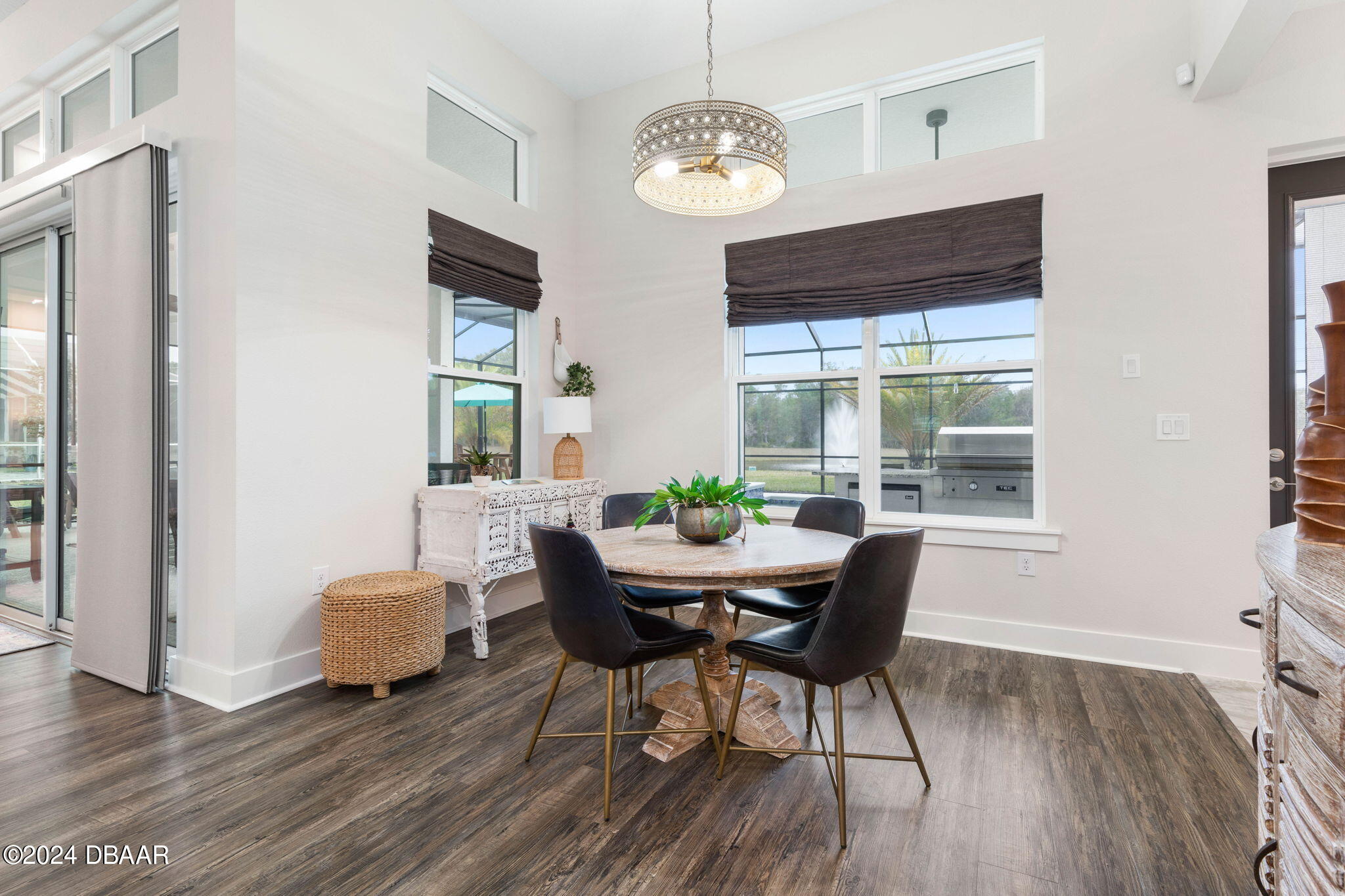 1405 Lilly Anne Circle Ormond Beach, FL 32174 - Photo 12 of 76 a view of a dining room with furniture window and wooden floor
