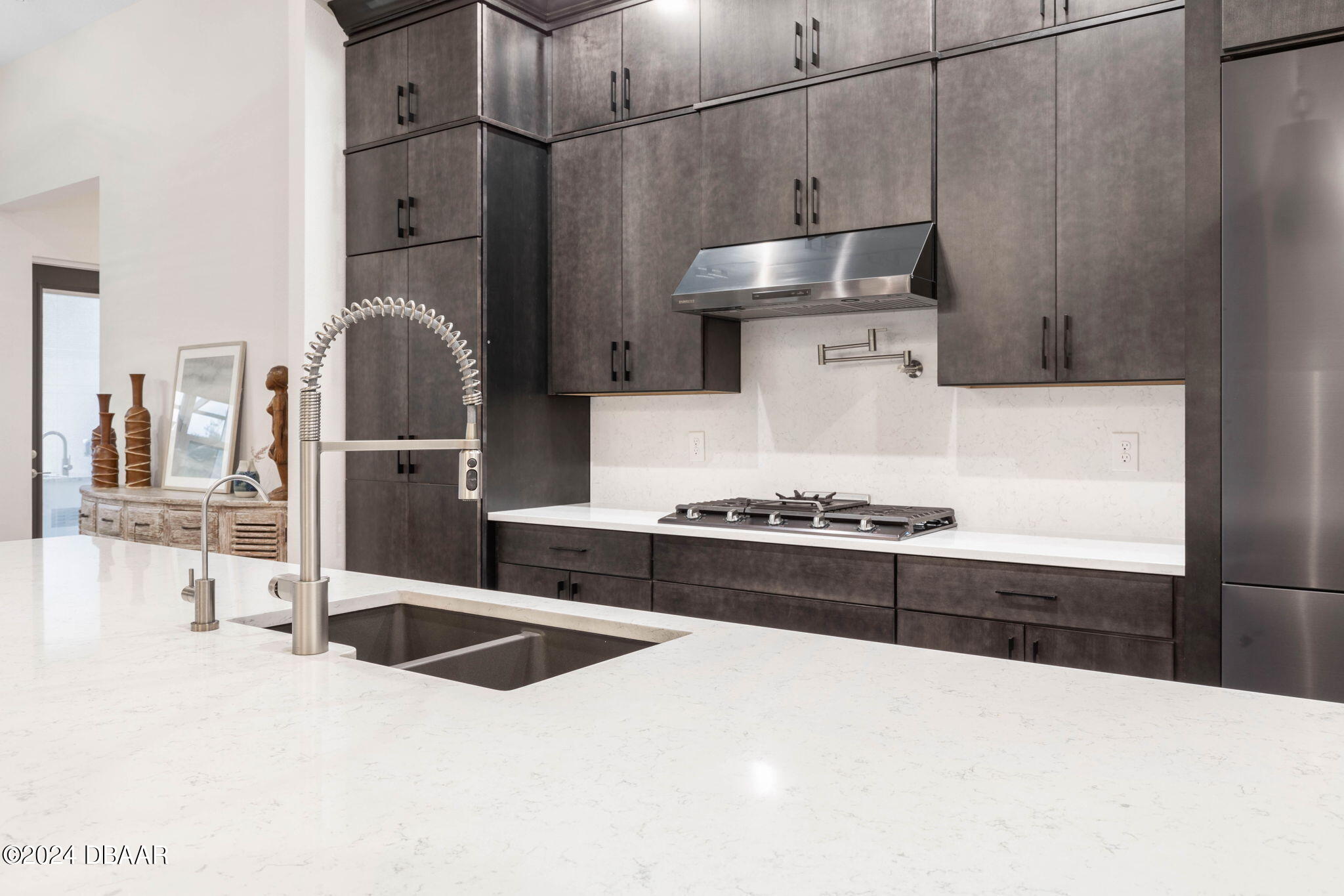 1405 Lilly Anne Circle Ormond Beach, FL 32174 - Photo 15 of 76 a kitchen with stainless steel appliances a sink a stove and a refrigerator
