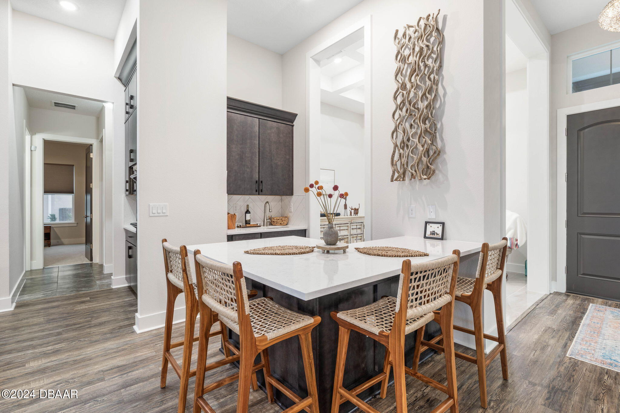 1405 Lilly Anne Circle Ormond Beach, FL 32174 - Photo 16 of 76 a view of a dining room with furniture and wooden floor